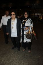 Bappi Lahiri snapped at airport on 19th March 2016